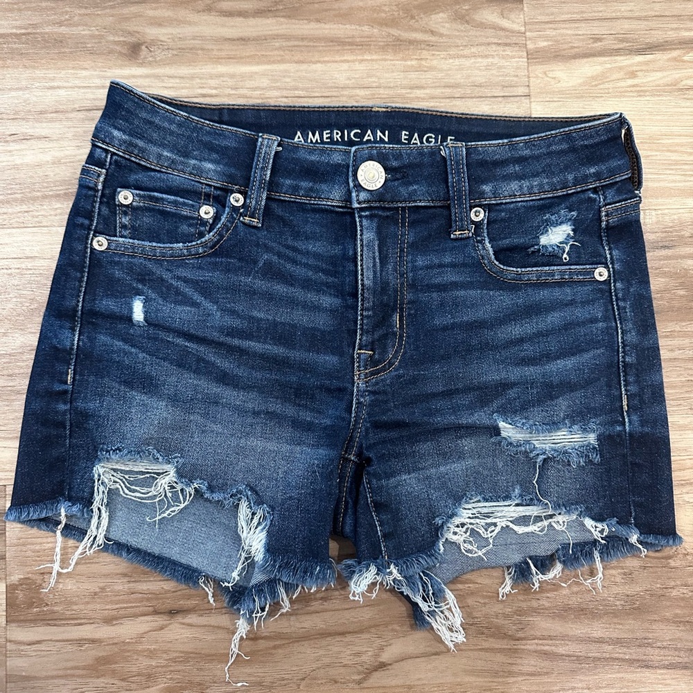 American Eagle Outfitters Women's Ripped Midi Jean Shorts 
Next level stretch